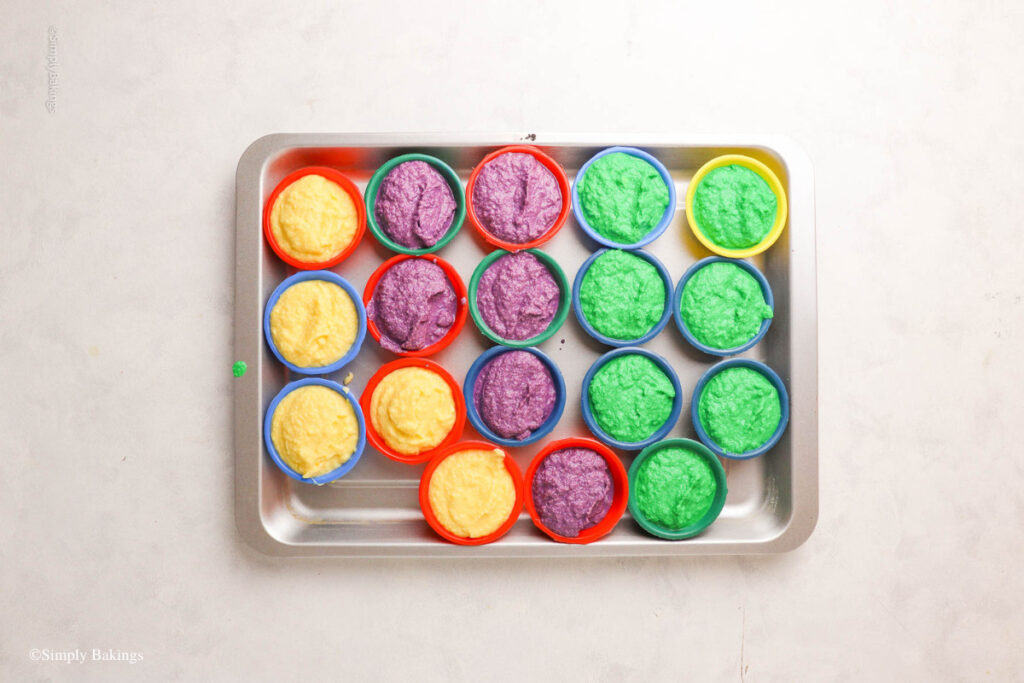 Molds filled with Pichi Pichi and set in baking pan