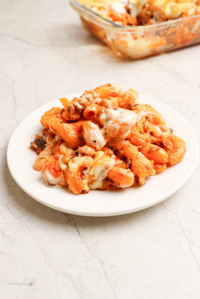 Macaroni baked with melted cheese bubbling on top
