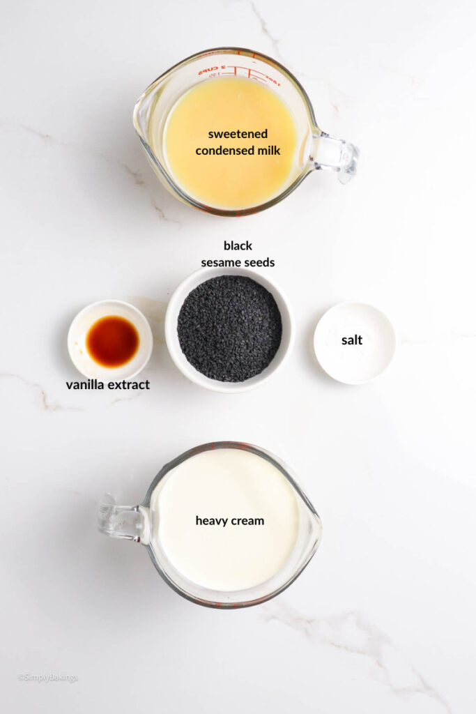 All ingredients for black sesame ice cream recipe in separate white bowls