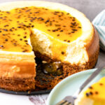 Passion Fruit Cheesecake cut with a slice