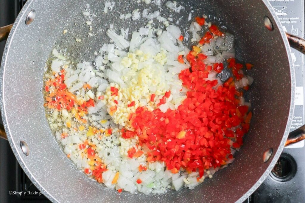 A pan filled with dices of vegetables