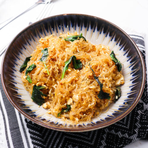 Glossy rice noodles filled with basil
