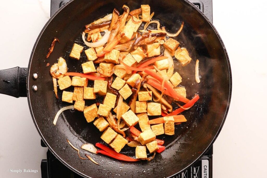 Cooked tofu and other veggies in a pan