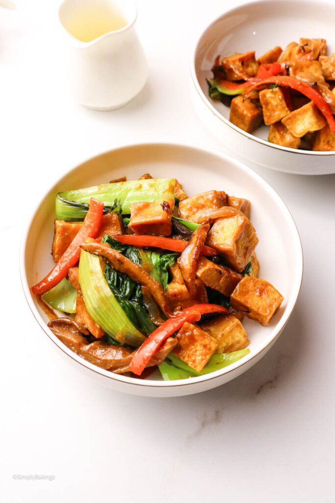 saucy miso tofu with bok choy in a white dish
