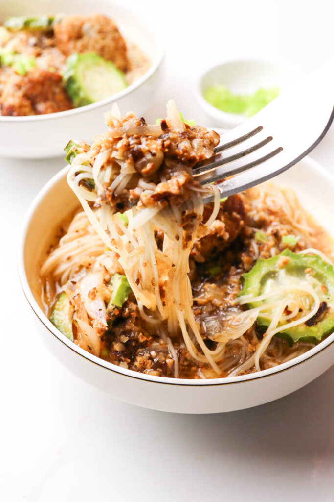 A bowl of delicious healthy Almondigas with fork