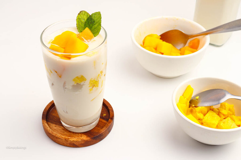 Agar Agar drink next to two bowls of mango cubes