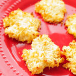 macaroon cookies on a red plate