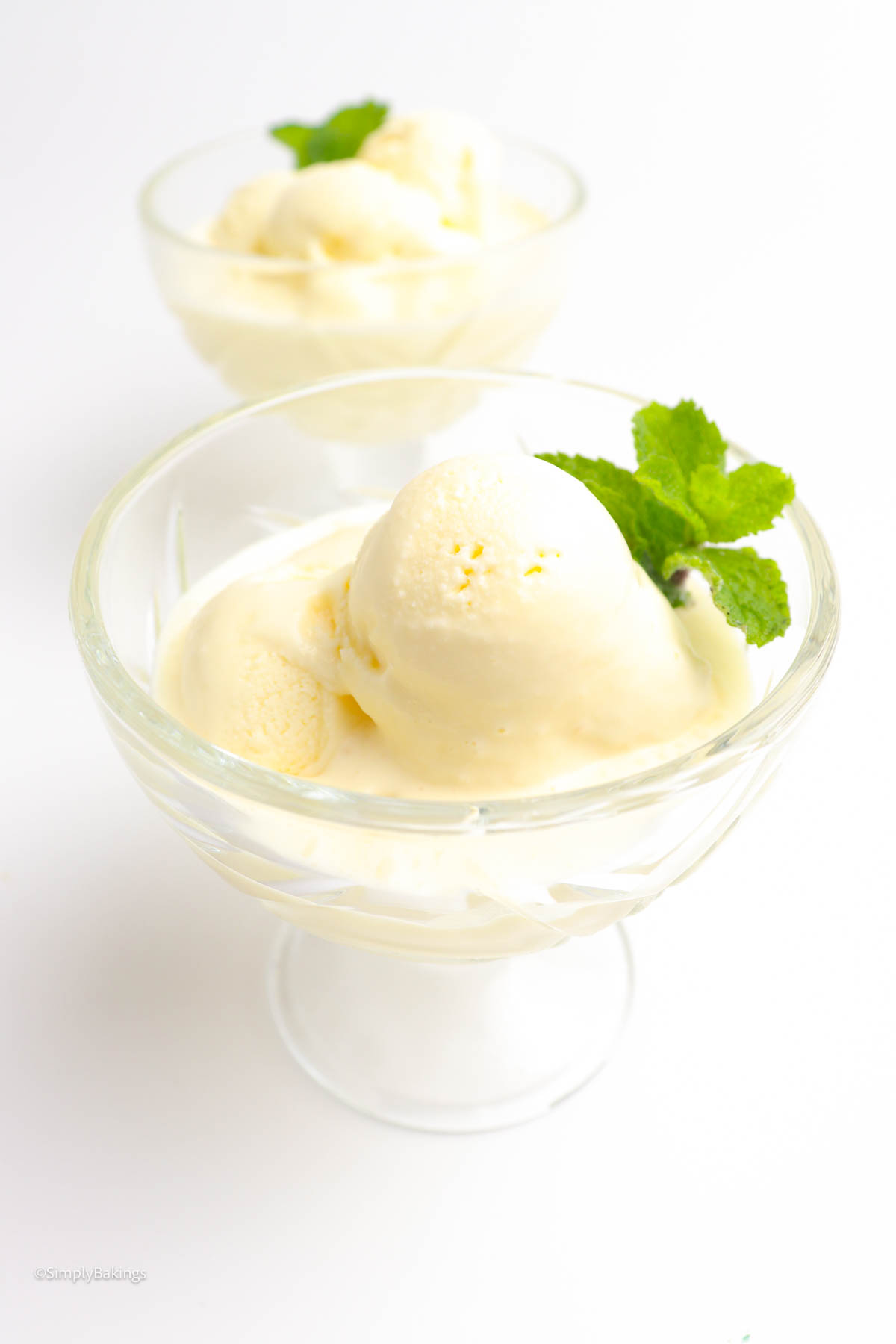 delicious durian ice cream servings in a clear glass garnished with peppermint leaves