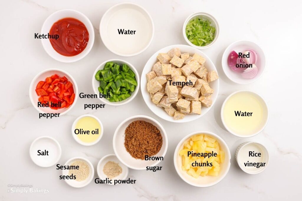 All ingredients for sweet and sour tempeh recipe in separate bowls