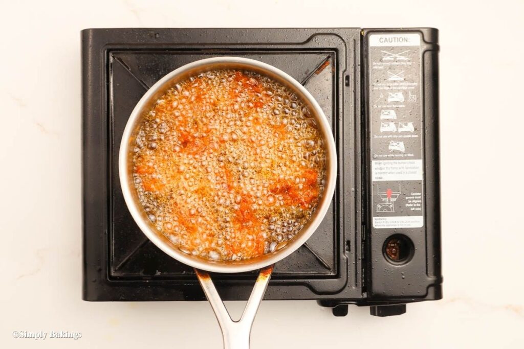Pan filled with cooking oil and fried seitan cutlets