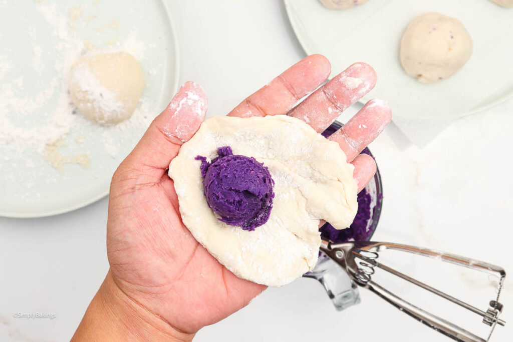 Taro purple paste added onto the dough