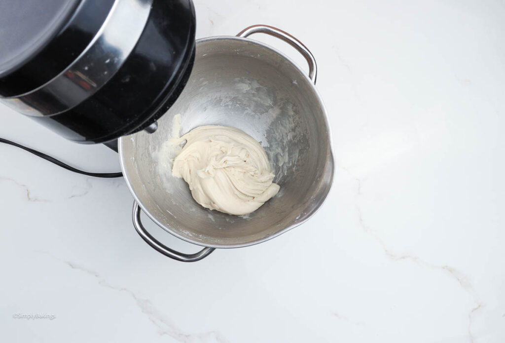 Yeast mixture and oil kneaded in mixer