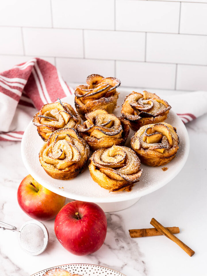 some Apple Roses served on a white plate