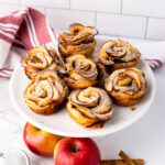 seven delicious Apple Roses arranged in a circular plate