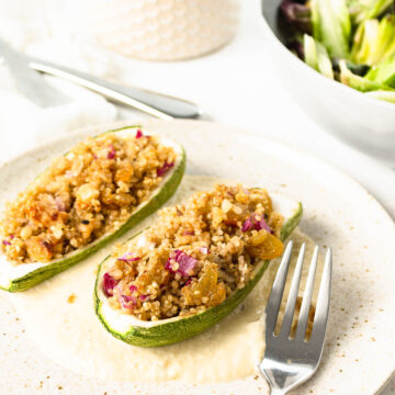 A fork next to the Vegan Stuffed Zucchini