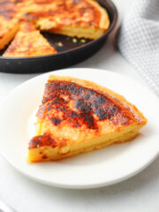 a slice of Filipino Egg Pie served on a white plate