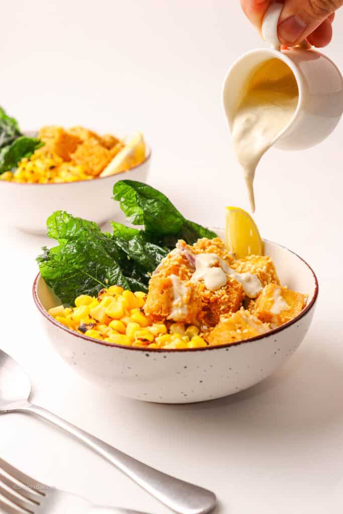 Coconut-wasabi sauce poured over Wasabi Tofu