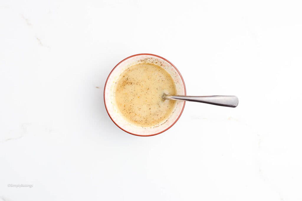 Flaxseed mixture and sesame seeds in a bowl
