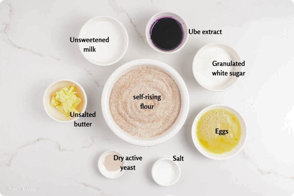 All ingredients for Coconut Ube Milk Bread in separate bowls