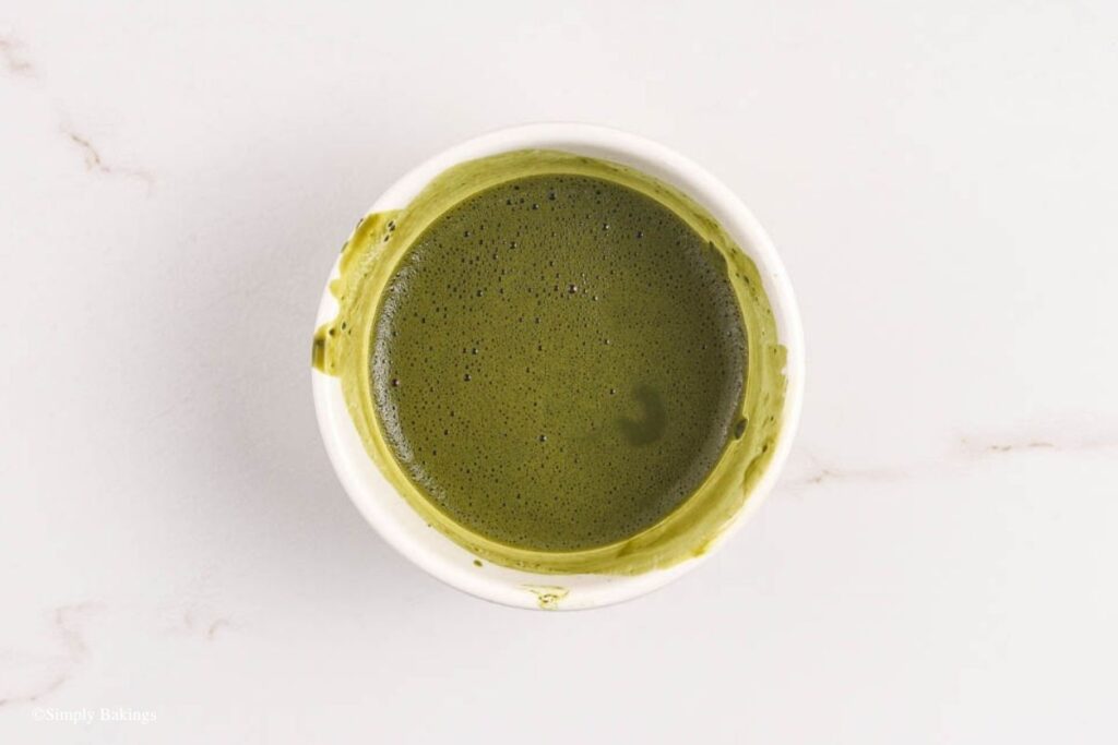 Small bowl of matcha syrup