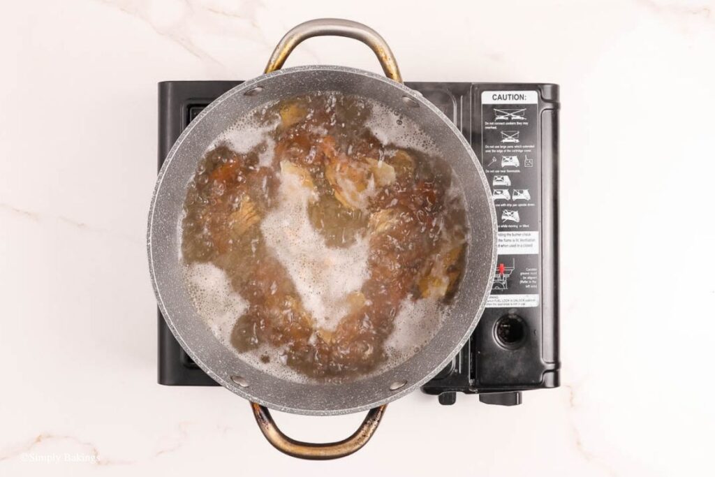 Pot with Tamarind and ginger simmering in it