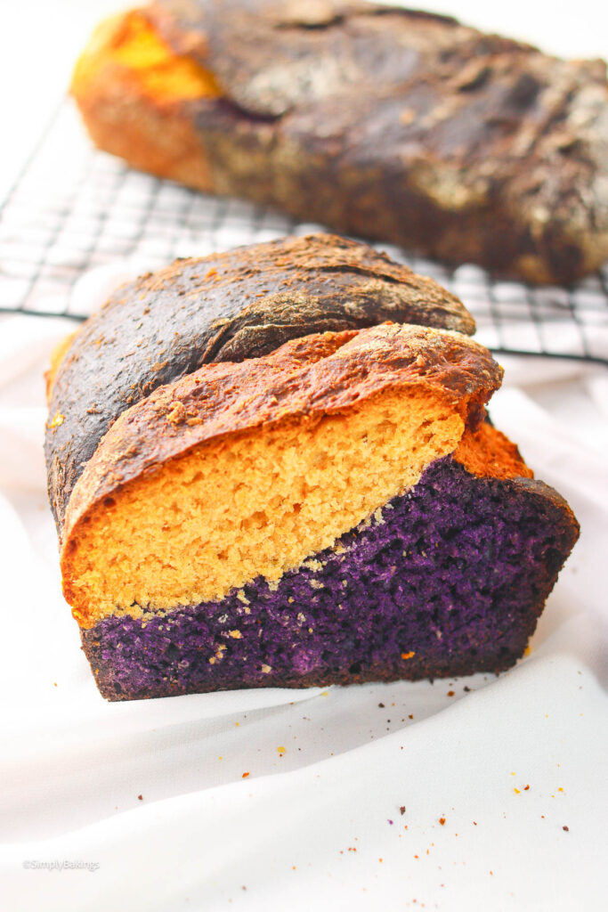 sliced Coconut Ube Milk Bread on a white cloth