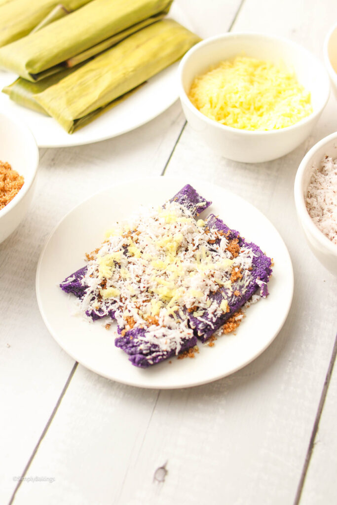 Puto Bumbong surrounded with other dishes