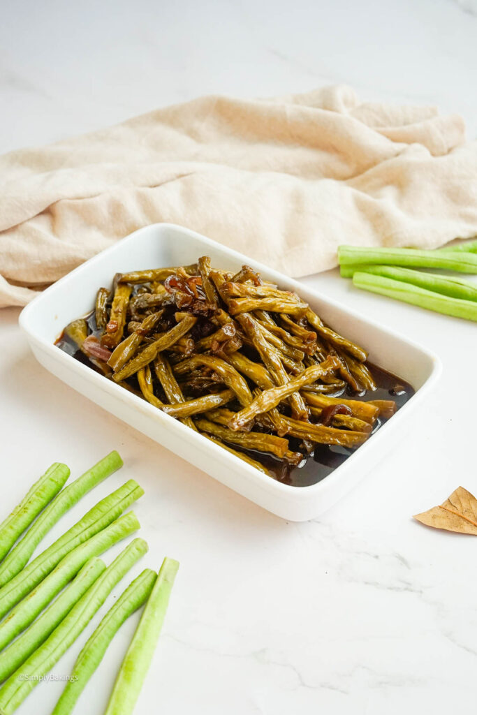 Adobong Sitaw Without Meat in a rectangular plate