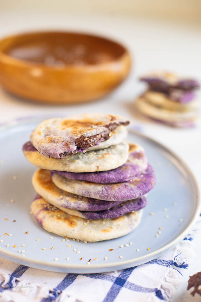 A tin plate filled with a pile of piayas being served