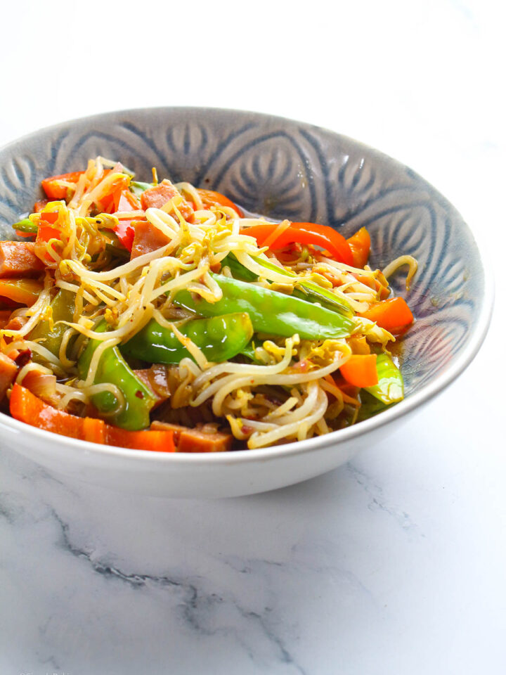 A bowl of Ginisang Togue at the table