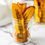 Crispy Plantain Chips crowded in a transparent cup