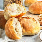 Three Crusty Walnut Rolls crowded together
