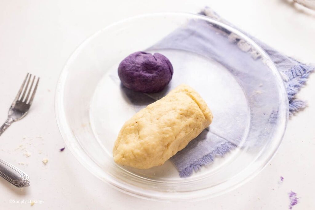 White and purple Piaya doughs in a bowl