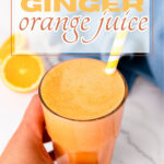 Fresh ginger orange juice in a tall glass