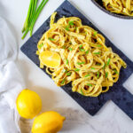 Vegan Lemon Pasta next to a few lemons
