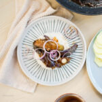 Hot and savory Eggplant Bisteak on a plate