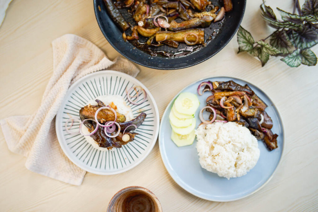 Two plates with Eggplant Bisteak servings