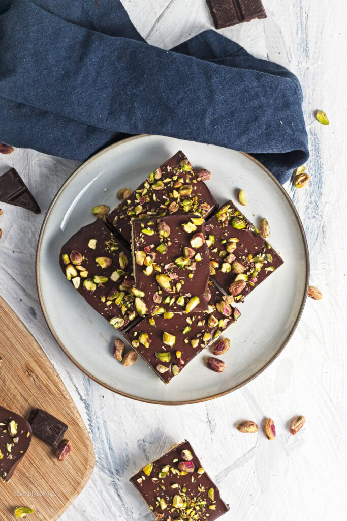 A stack of delicious Pistachio Chocolate Bars on a plate