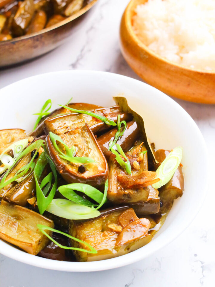 Adobong Talong served in a white bowl