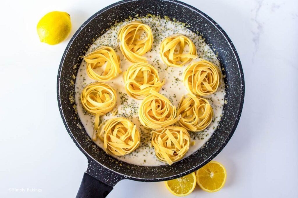 added swirls of pasta on the pan