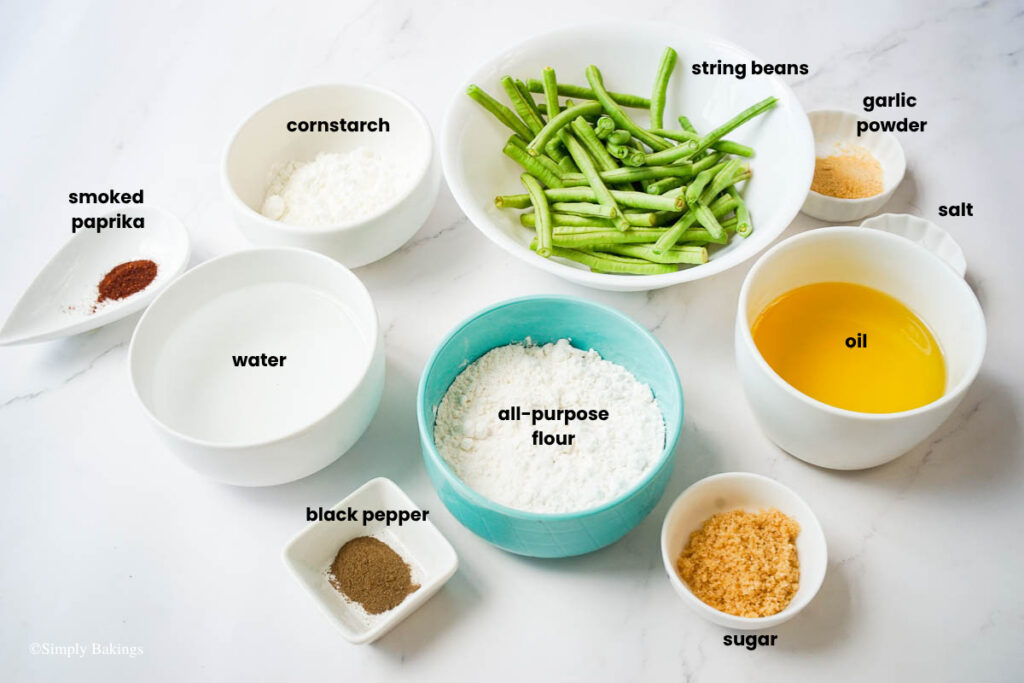 All ingredients for deep fried string beans in bowls
