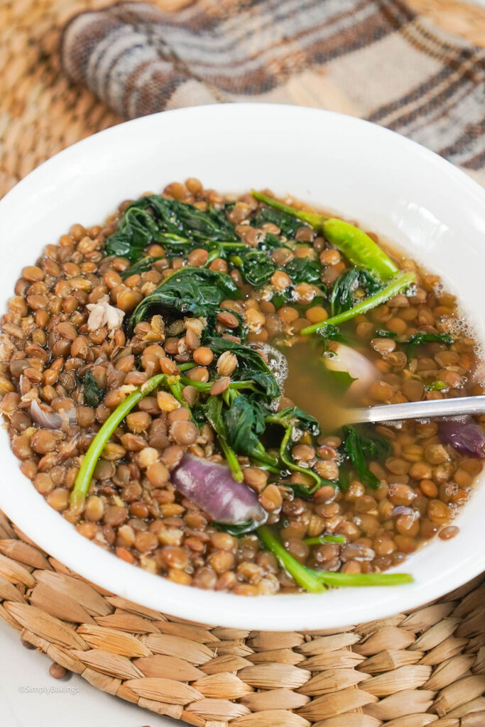 Filipino Lentil Soup with a spoon