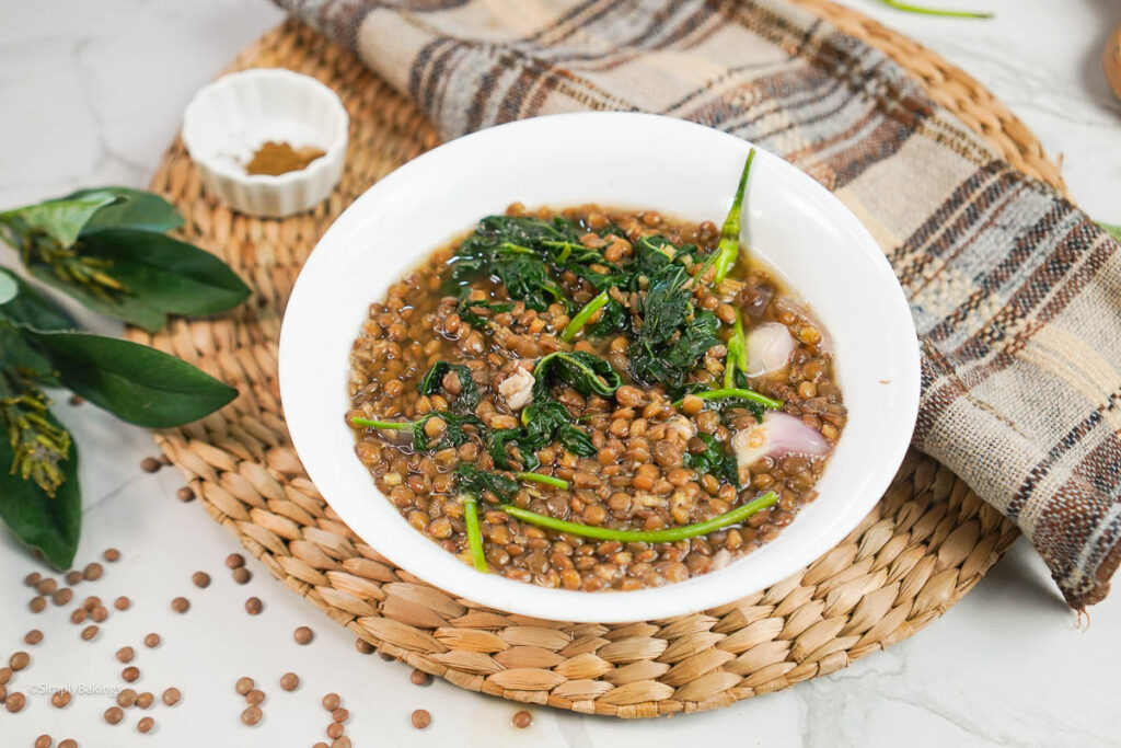 Filipino lentil soup in a small bowl