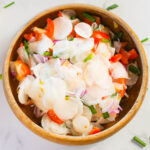 Filipino Radish Salad served in a wooden bowl at the table