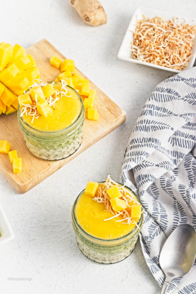 Pudding surrounded by chopped mango