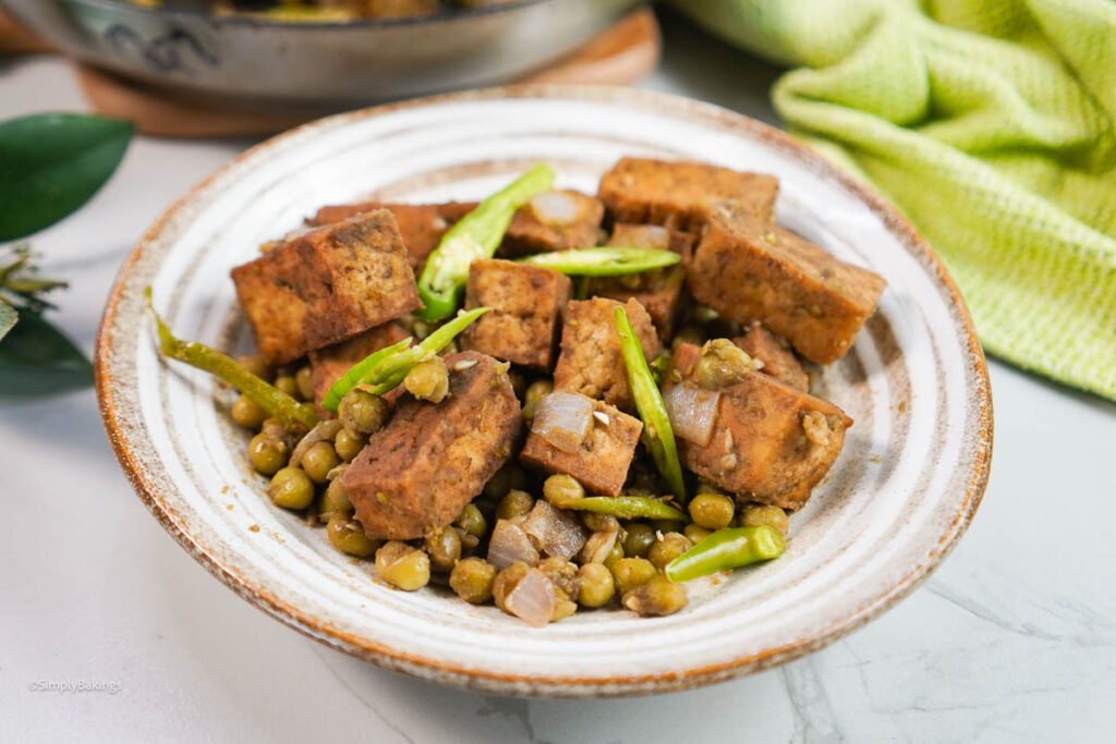 A bowl of Spicy Balsamic Tofu with Green Peas