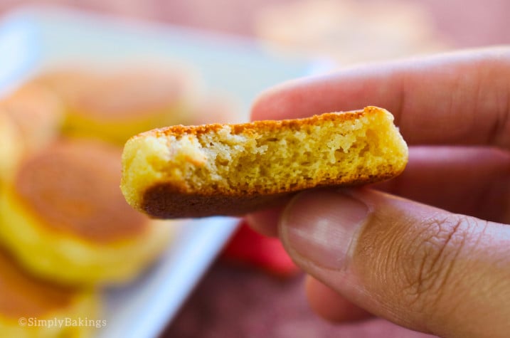 Half-eaten pancake cookie held up